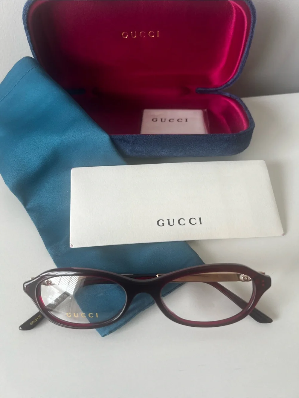 Gucci Women's Burgundy Cat-Eye Glasses with Gold Accents